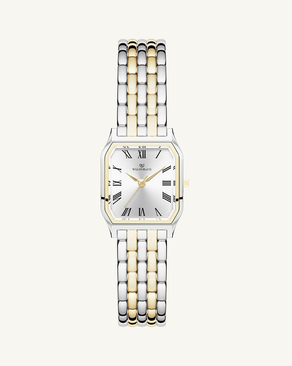 En fyrkantig damklocka i 22k guldpläterat 316L rostfritt stål från WALDOR & CO. med vit Diamond Cut Sapphire Crystal glass urtavla. Seiko urverk. Modellen är Eternal 22 Bellagio.