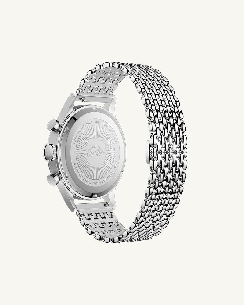 A round mens watch in rhodium-plated silver from Waldor & Co. with black sunray dial and a second hand. Seiko movement. The model is Avant 42 Sardinia 42mm.
