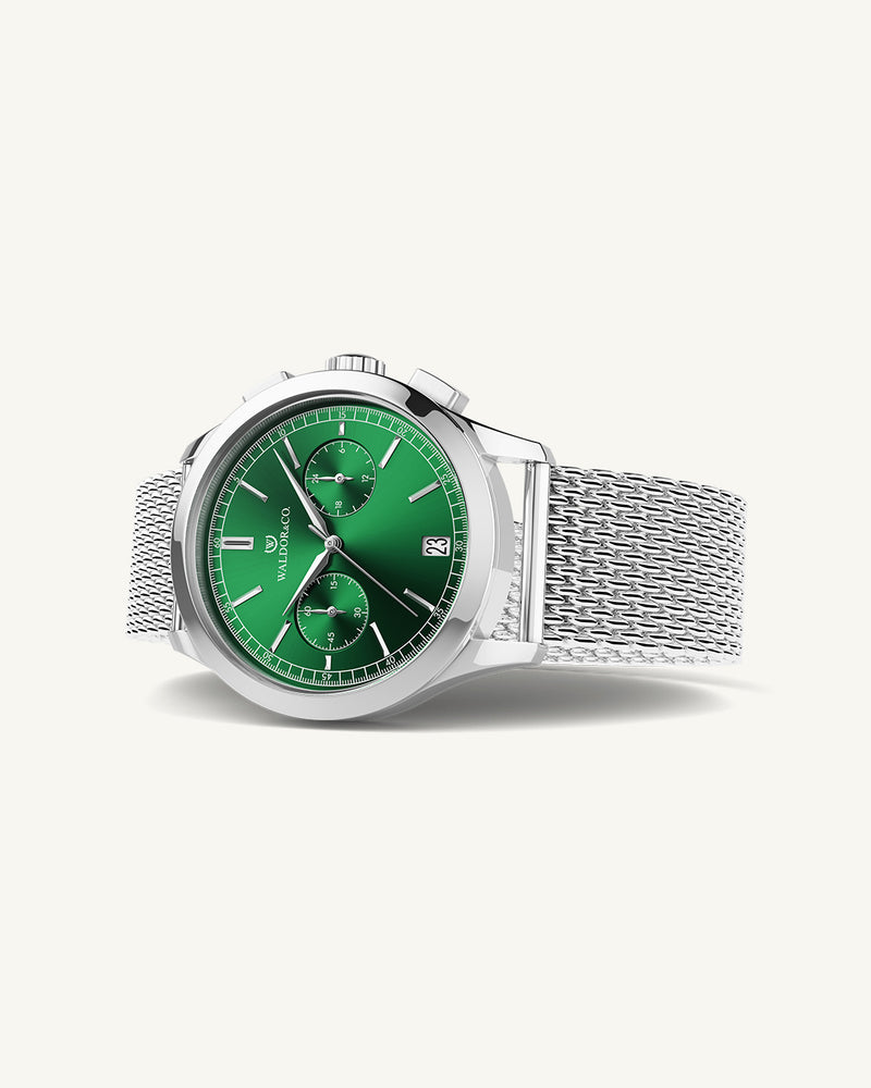 A round mens watch in rhodium-plated silver from Waldor & Co. with deep-green sunray dial and a second hand. Seiko movement. The model is Chrono 39 Sardinia 39mm.