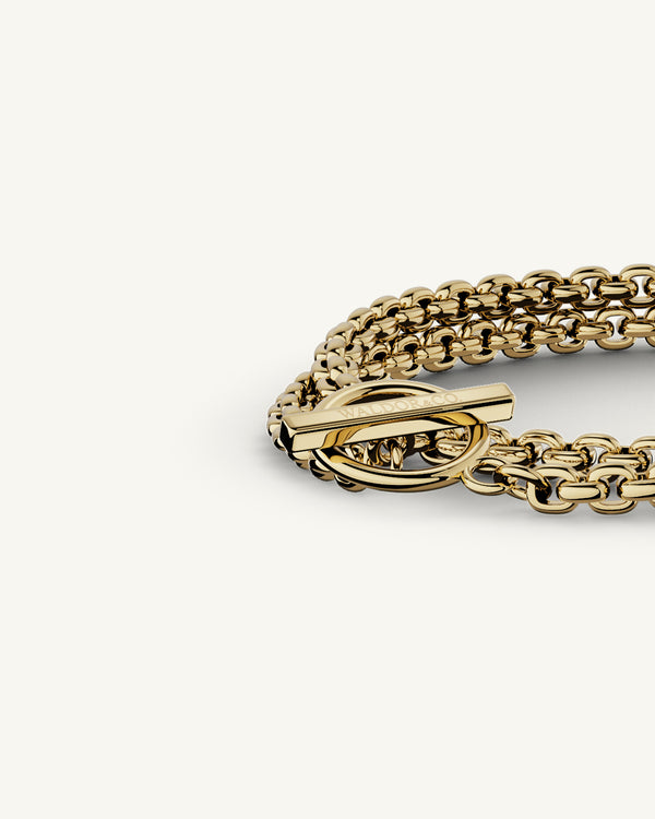 A 14-k gold plated stainless steel chain in silver from WALDOR & CO. The model is Dual Chain Polished.