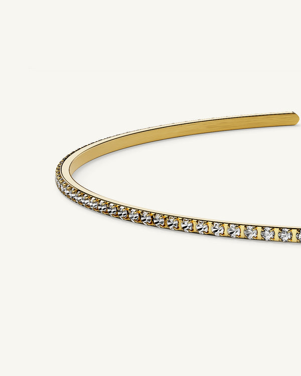 A Bangle in 14k gold-plated 316L stainless steel from Waldor & Co. One size. The model is Dulcet Bangle Polished.