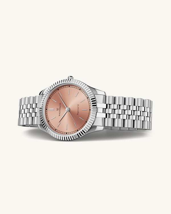 A round womens watch in silver from Waldor & Co. with salmon sunray dial and a second hand. Seiko movement. The model is Imperial 32 Positano 32mm.