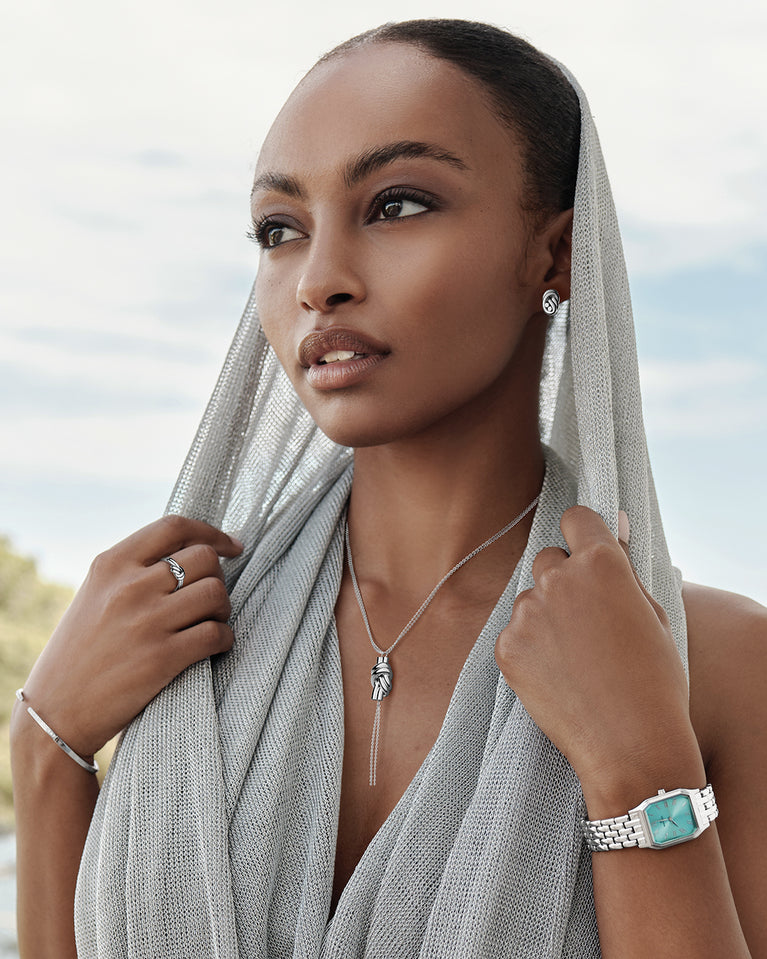  A Ring in Silver plated-316L stainless steel from Waldor & Co. The model is Dual Knot Ring Polished.