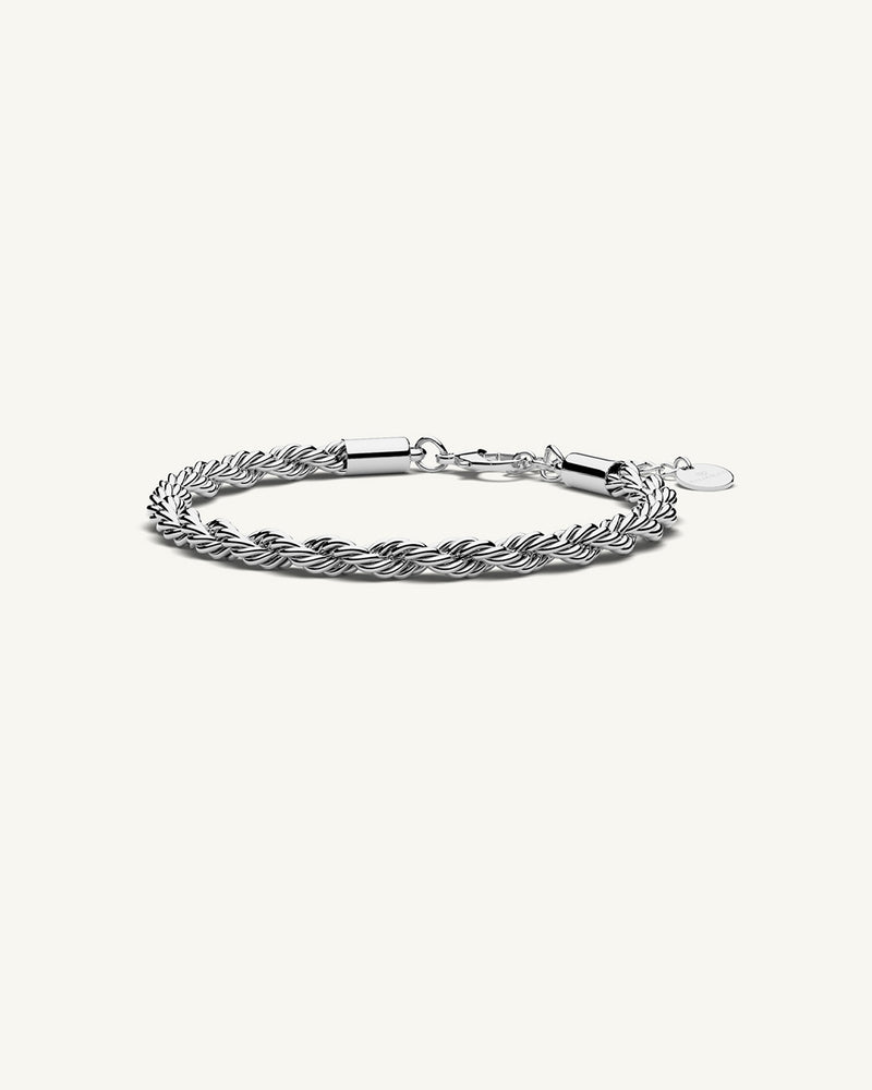 A Chain Bracelet in Silver Polished Stainless Steel from Waldor & Co. The model is Olmo Chain Polished Silver