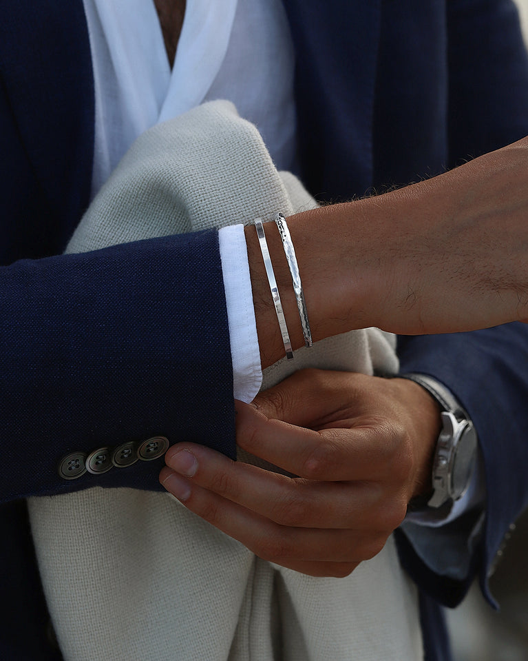 A Round Bangle in 925 Sterling Silver from Waldor & Co. The model is Opal Bangle Sterling Silver