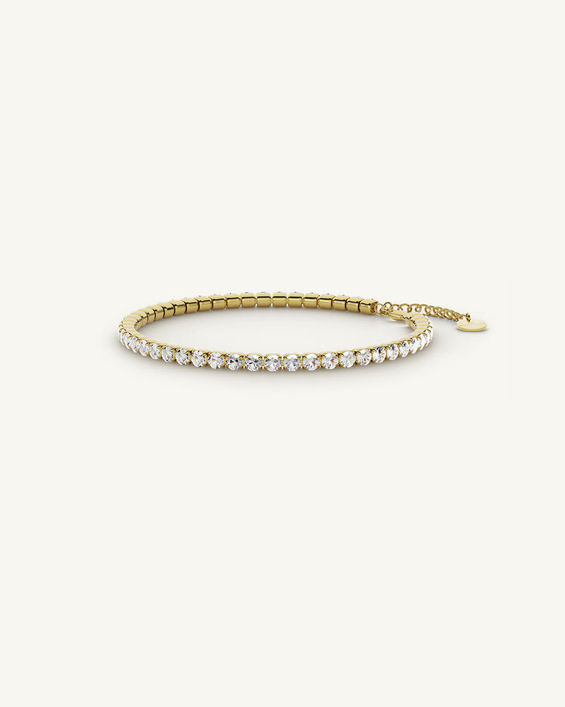 A polished stainless steel chain in 14-k gold plated from Waldor & Co. One size. The model is Tennis Chain Polished'