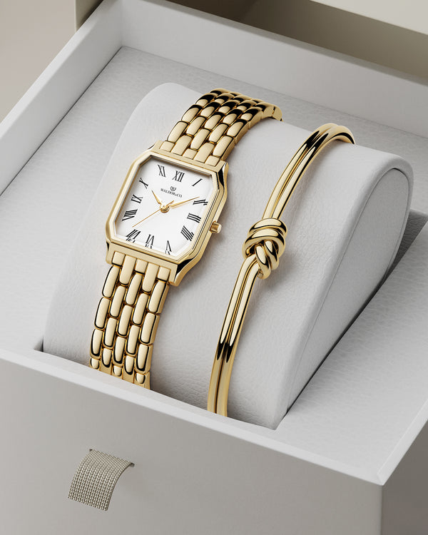lifestyle_image,A square womens watch in 22k gold from Waldor & Co. with white Diamond Cut Sapphire Crystal glass dial. Seiko movement. The model is Eternal 22 Bellagio.